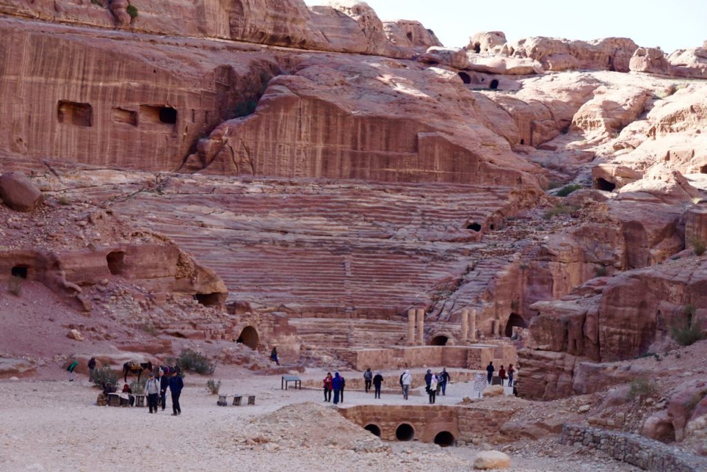 Amphitheater carved out of the solid rock wall. The columns are remnants of the stage built by the Romans.